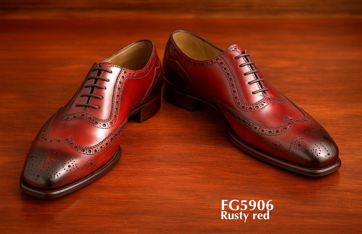 Zapato Brogue cosido al marco hecho a medida color rojo óxido